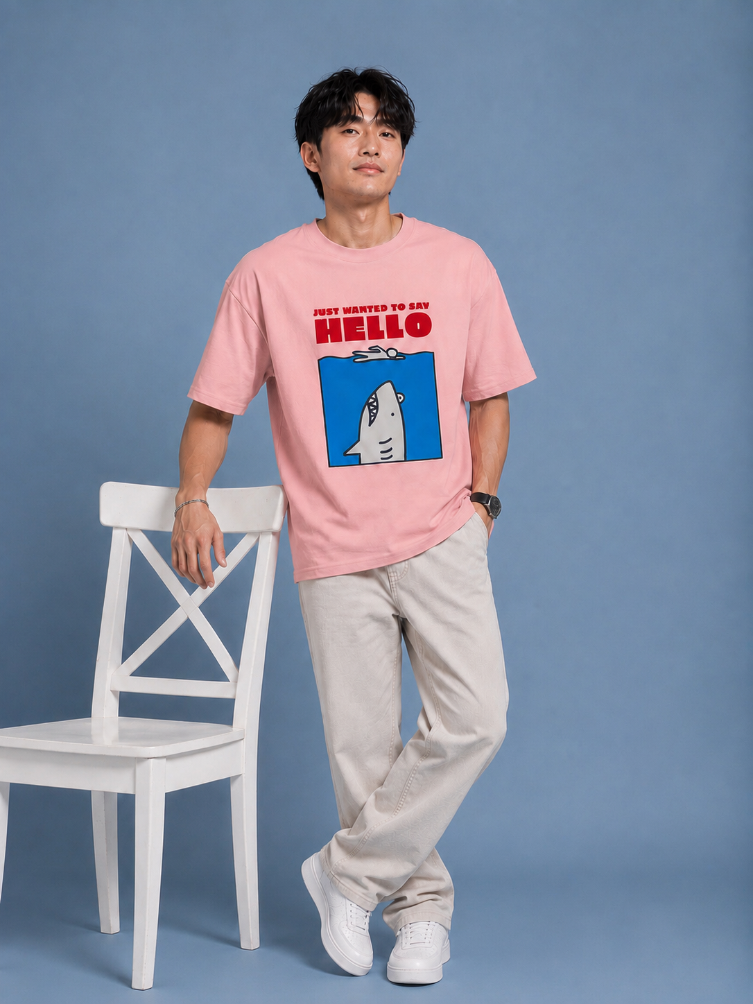 Bold HELLO illustration design on pink graphic tee