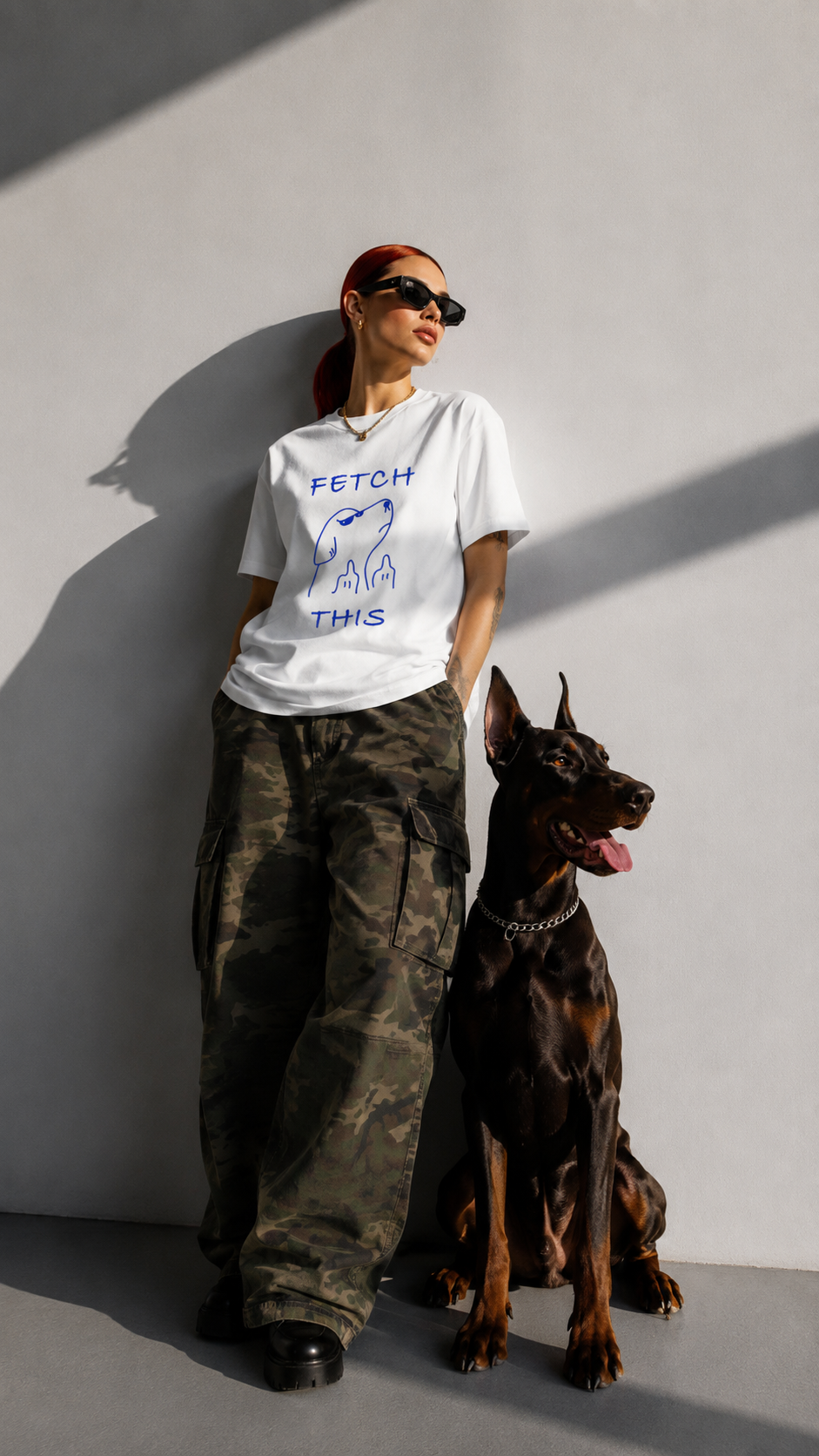 Fetch this funny dog graphic tee with blue hand-drawn design on white