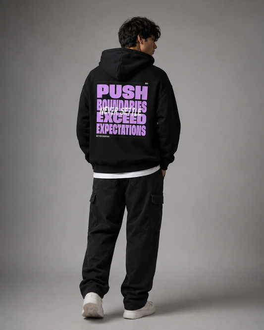 Push Boundaries black graphic hoodie with purple typographic back print